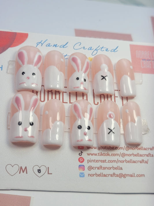 A picture of rabbit inspired nails for cutesy style