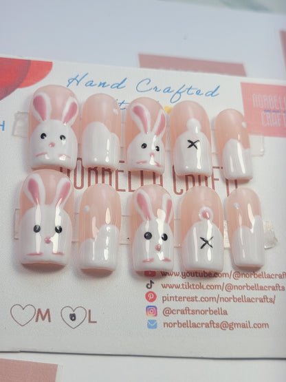 A picture of rabbit inspired nails for cutesy style