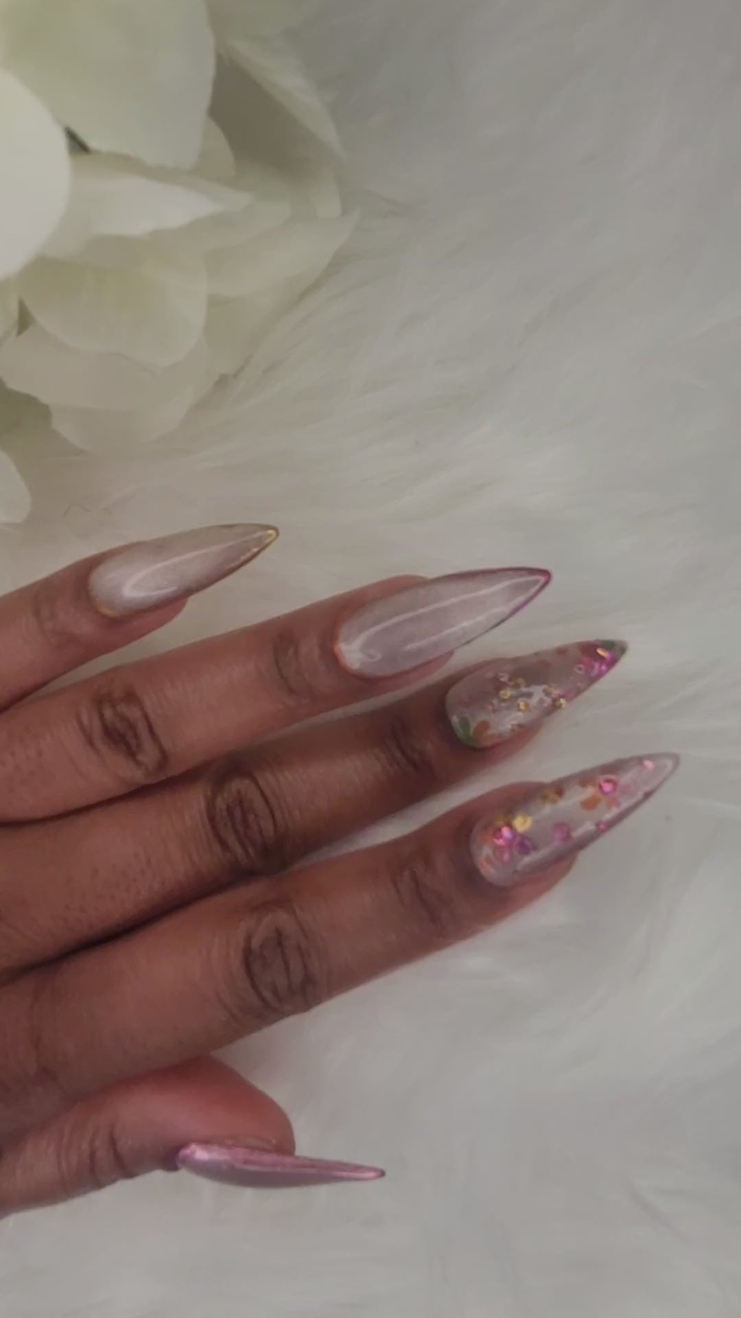 video of floral cat eye nail