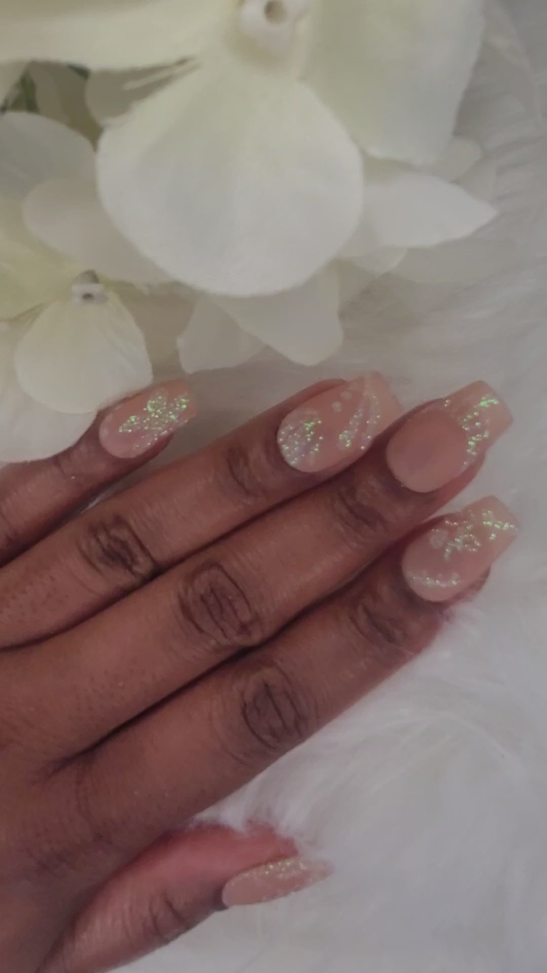 video displaying minimalistic glitter nails