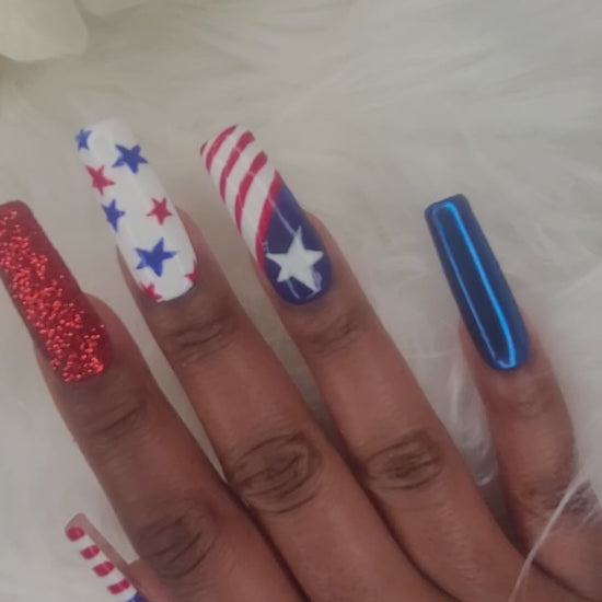 Video of woman's hands showcasing American design for press on nails